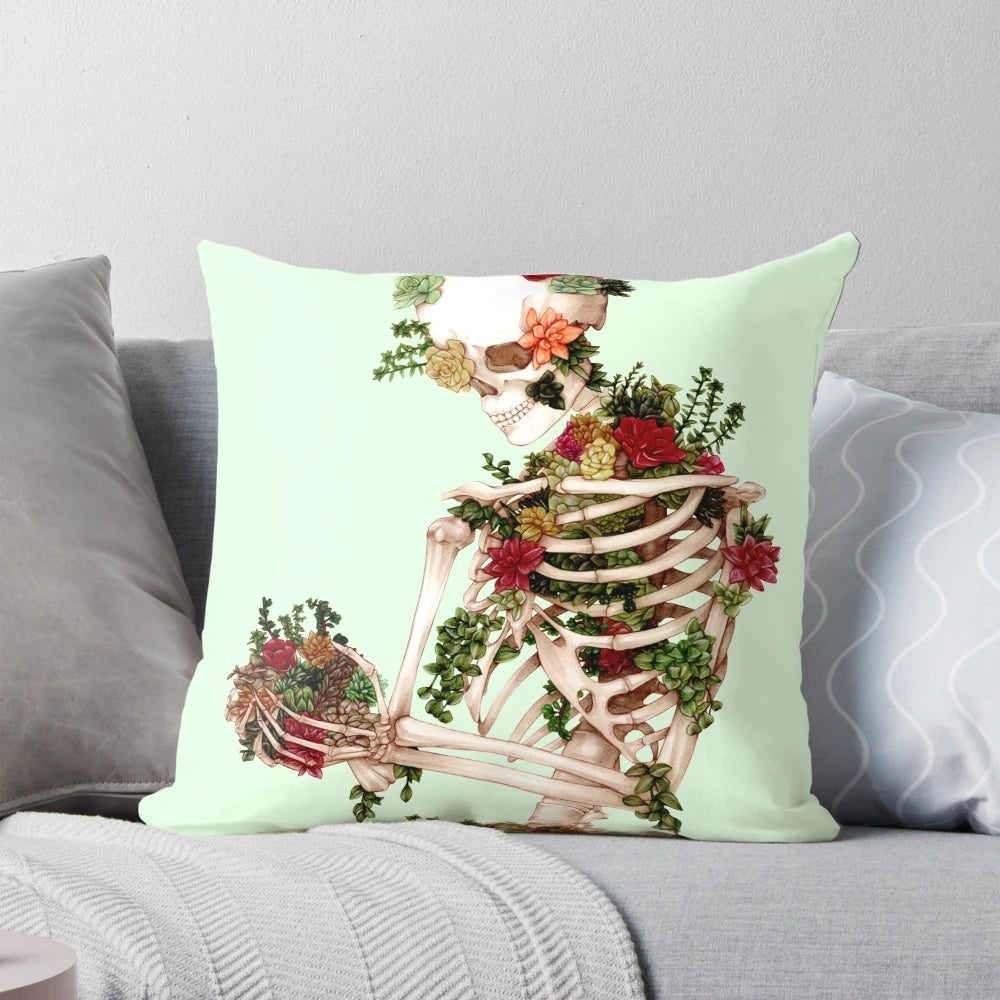 A decorative throw pillow featuring a design of a skeleton with succulents and botanical elements.