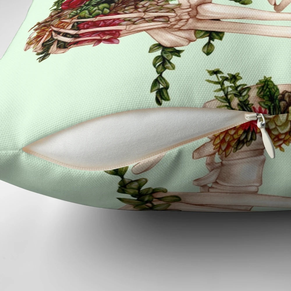 A decorative throw pillow featuring a design of a skeleton with succulents and botanical elements.