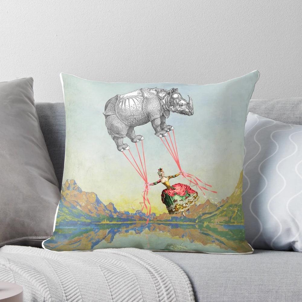 Aloft Pillow featuring a surreal collage design with a rhino in a hot air balloon, inspired by fantasy and Marie Antoinette themes.