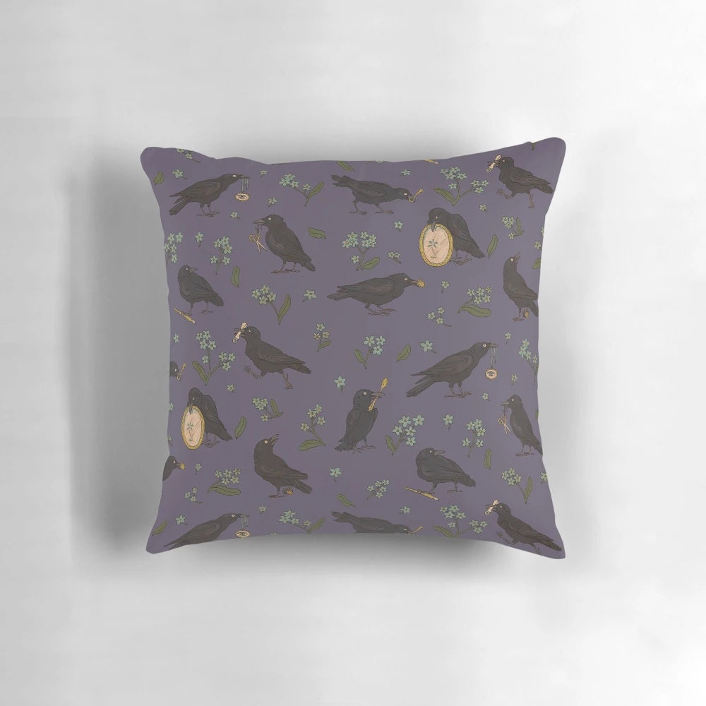 Raven and crow decorative pillow featuring a fairytale-inspired design