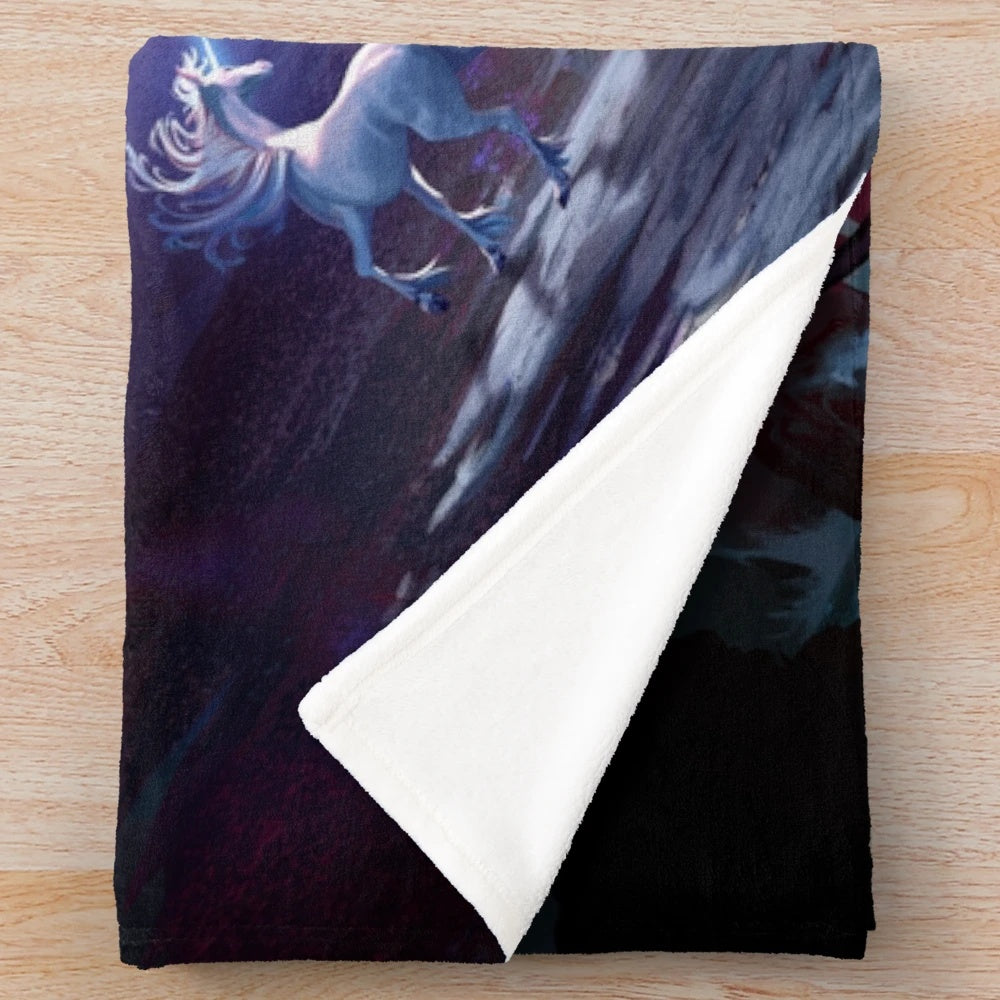 The Last Unicorn inspired plush blanket featuring a magical unicorn