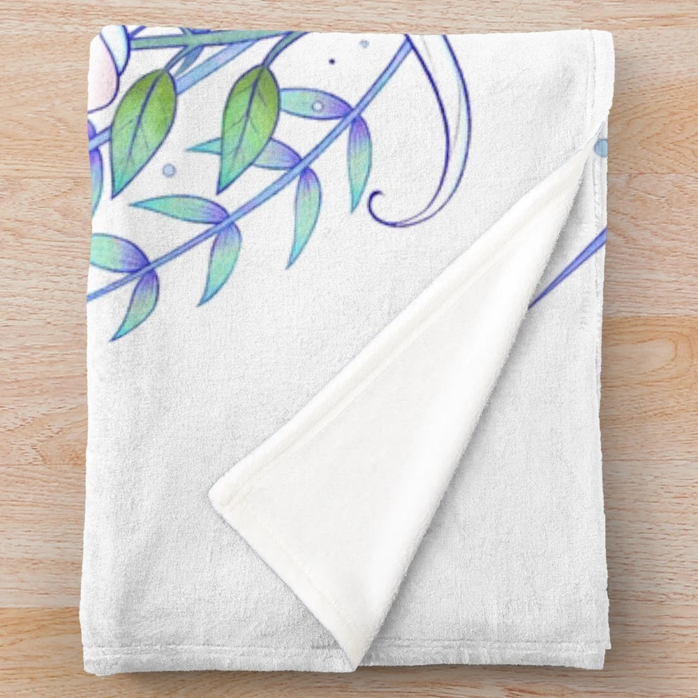 The Last Unicorn-inspired plush blanket featuring a whimsical unicorn design