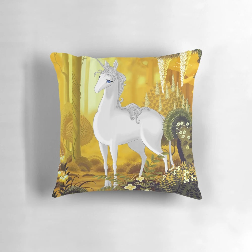 The Last Unicorn throw pillow featuring the iconic unicorn character Amalthea from the classic 1980s fantasy animation film.