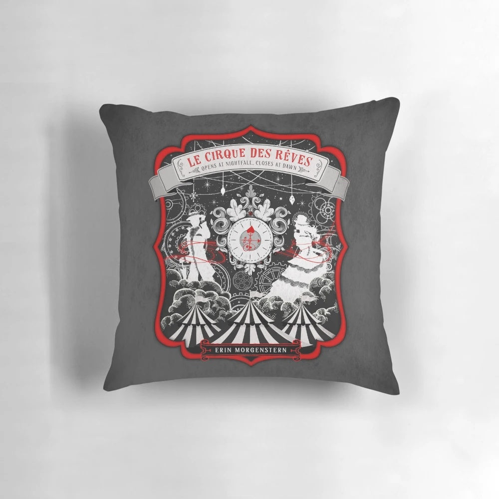 A beautifully designed pillow featuring a silhouette of figures against a starry night sky, evoking the magical atmosphere of "The Night Circus
