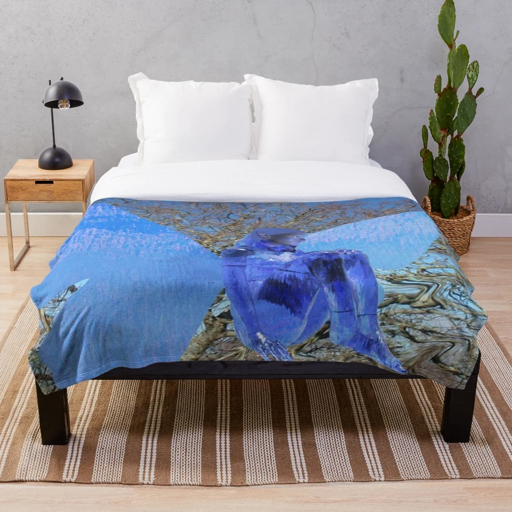 Soft, textured plush blanket with a whimsical tree fairy and butterfly design, perfect for adding a touch of fantasy to your home.