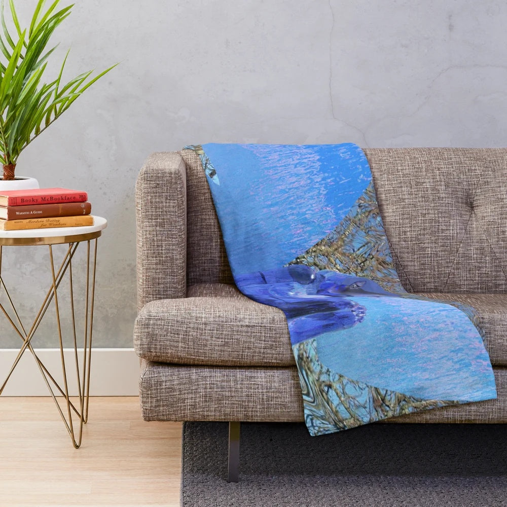 Soft, textured plush blanket with a whimsical tree fairy and butterfly design, perfect for adding a touch of fantasy to your home.