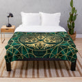 Tree of life with triquetra, malachite, and gold plush blanket
