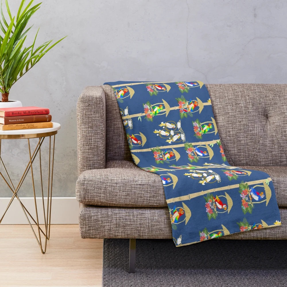 Colorful plush blanket featuring tiki room birds in a tropical paradise