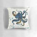 Whimsical abstract art pillow featuring a blue, green, and gold underwater dream scene with an octopus and sea monster.