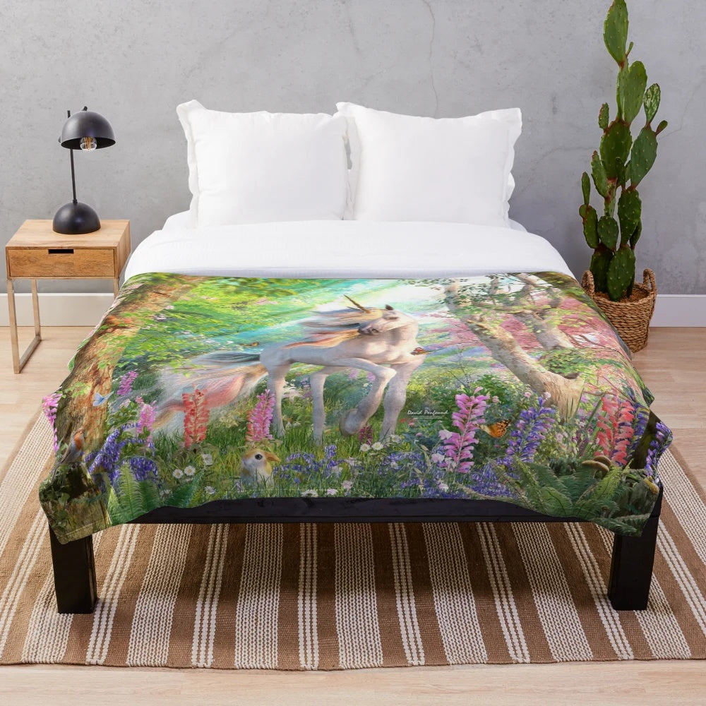 Enchanting unicorn-themed plush blanket featuring a fantasy forest scene with butterflies and rainbows