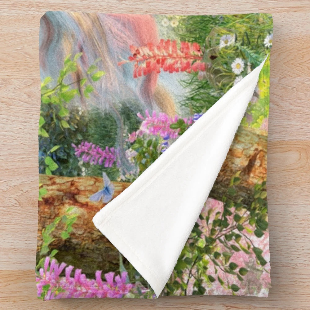 Enchanting unicorn-themed plush blanket featuring a fantasy forest scene with butterflies and rainbows