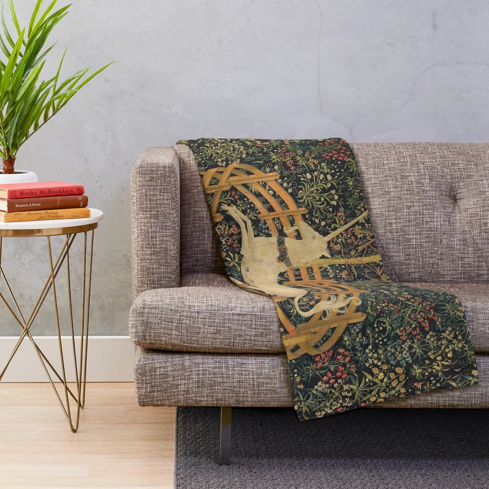 Plush blanket featuring the iconic "Unicorn in Captivity" fantasy artwork