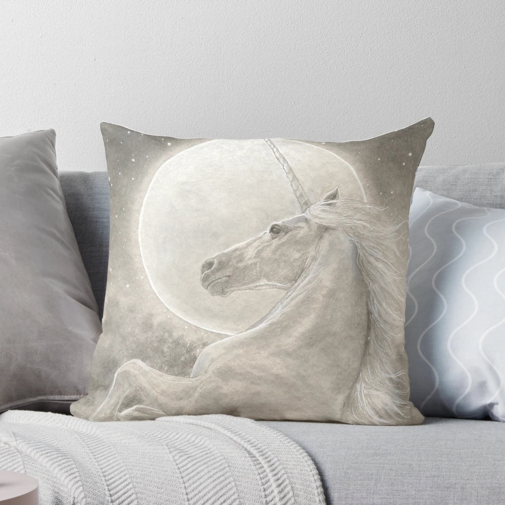 Soft, plush unicorn pillow with a magical moon design, perfect for fantasy and celestial-themed decor.