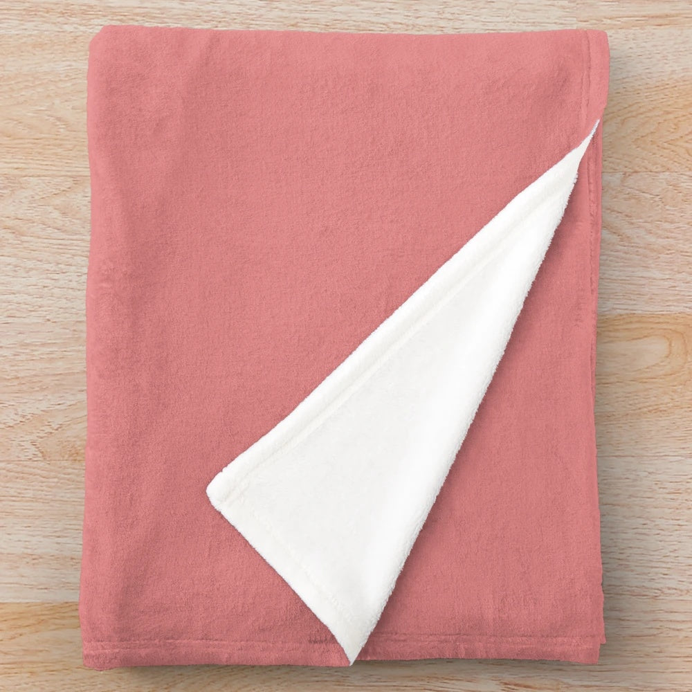 Soft, plush unicorn blanket in a retro rainbow design