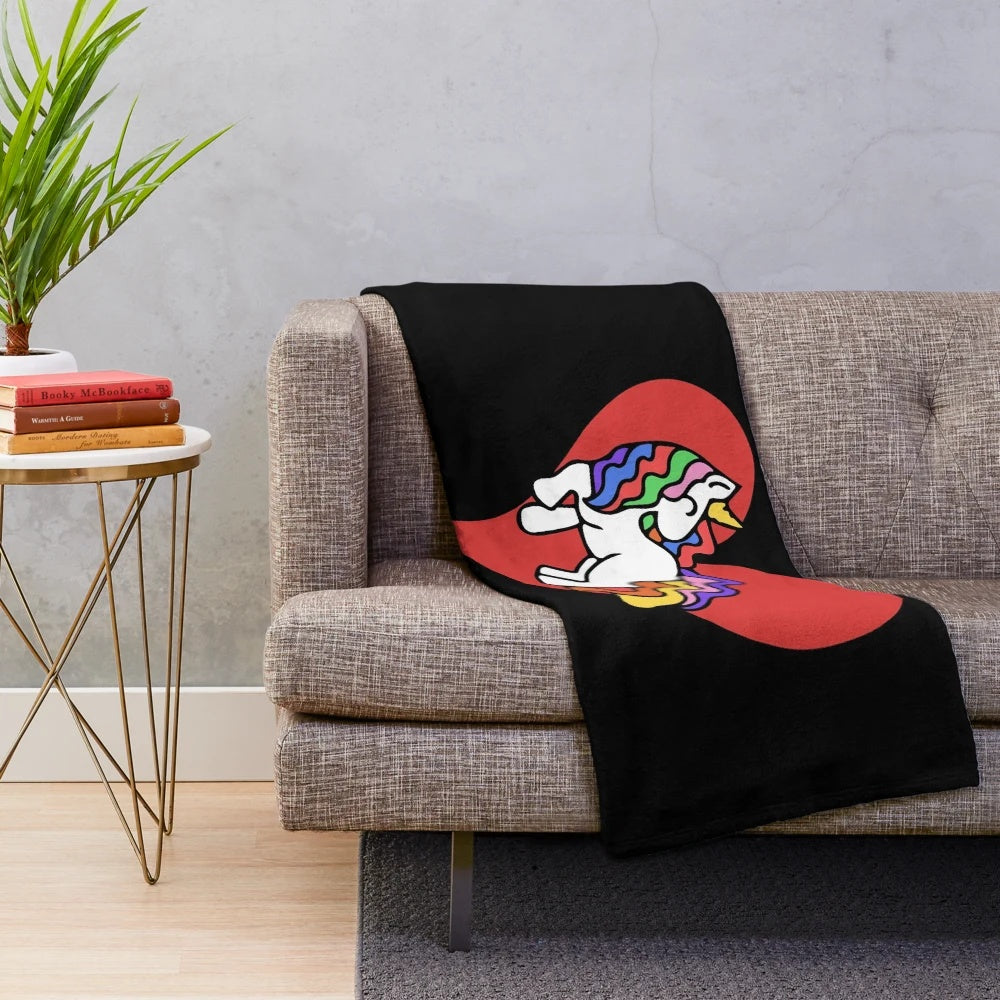 Soft unicorn plush blanket with rainbow and heart designs