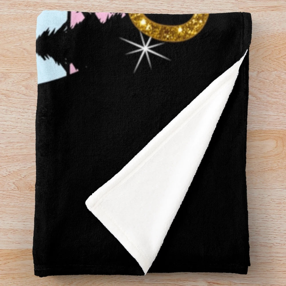 Vibrant unicorn design on a cozy plush blanket
