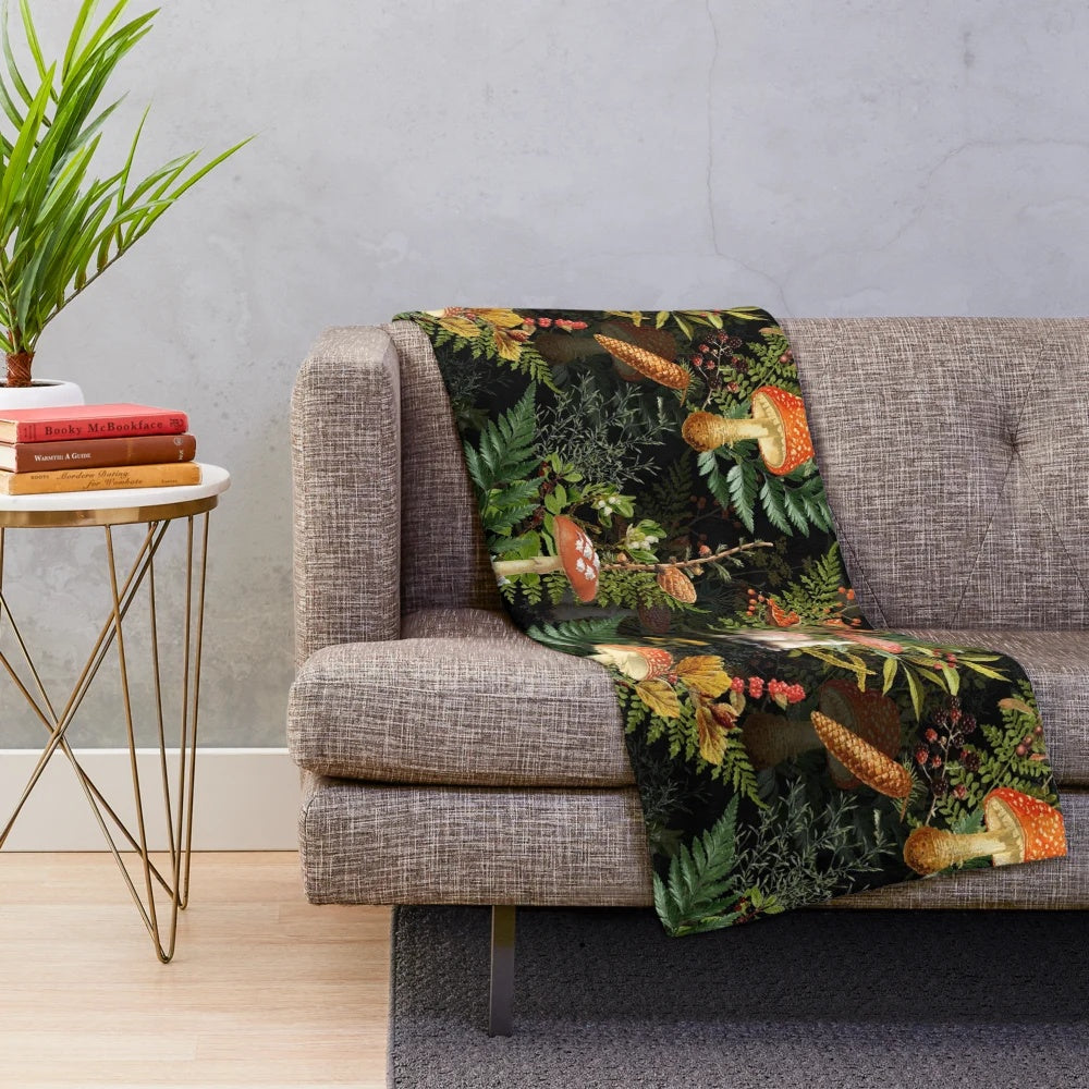 Vintage botanical plush blanket featuring midnight toadstools in a forest setting