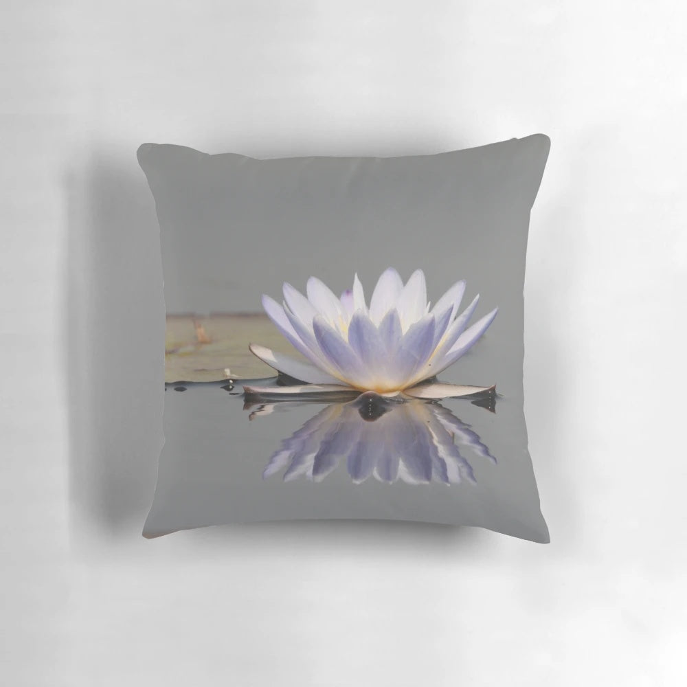 Close-up view of a beautiful water lily flower printed on a decorative pillow