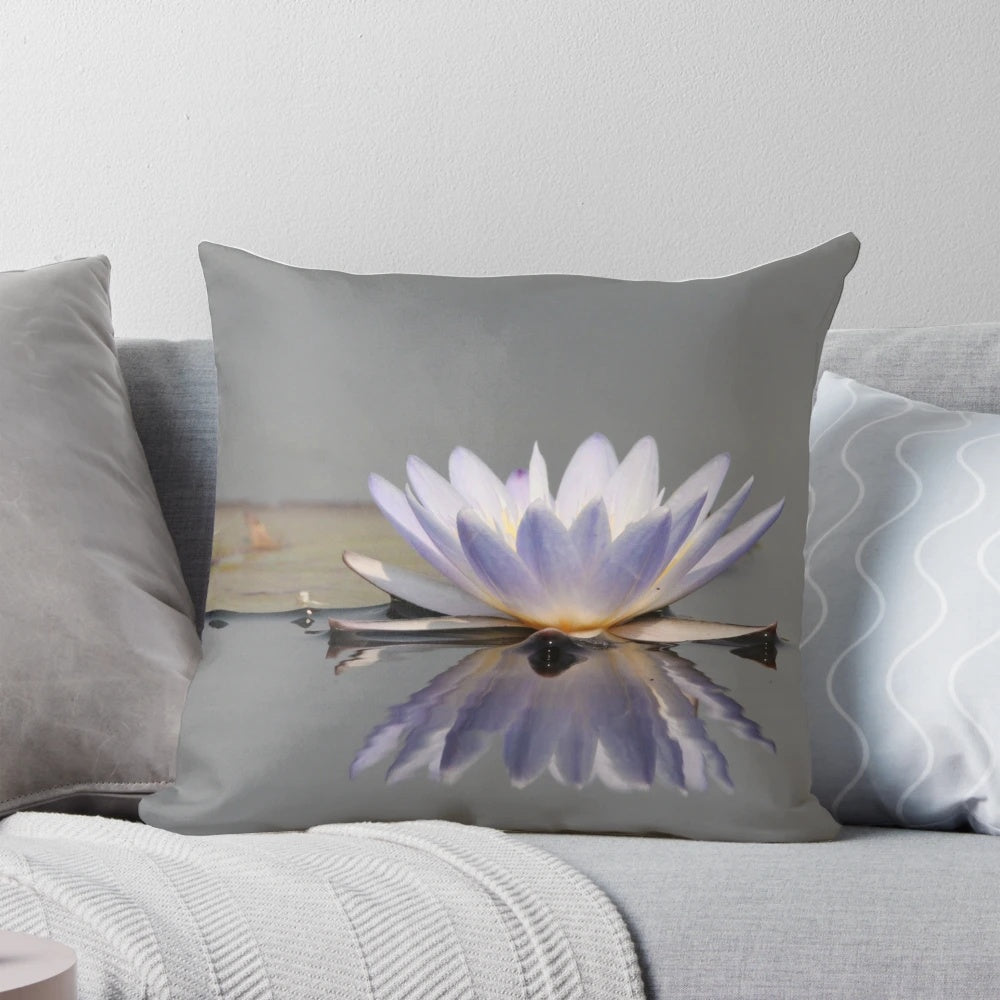 Close-up view of a beautiful water lily flower printed on a decorative pillow