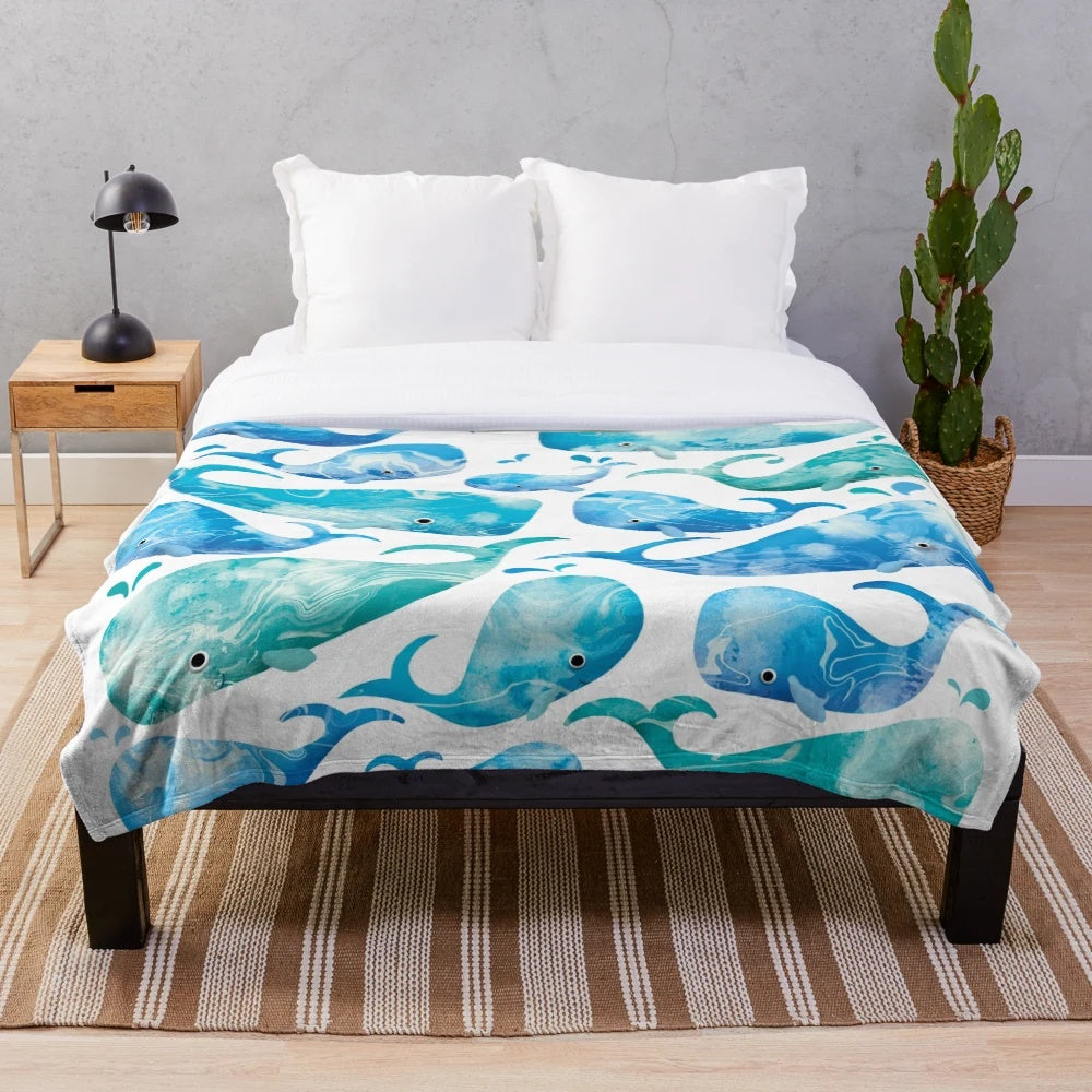 Whales plush blanket featuring a beautiful marine wildlife design