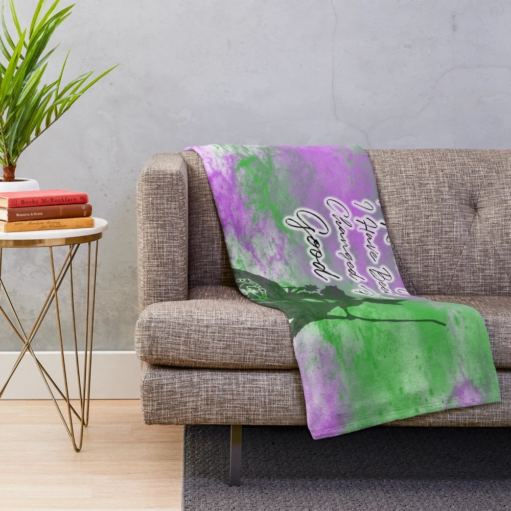 Wicked-inspired plush blanket with silhouettes of Elphaba and Glinda