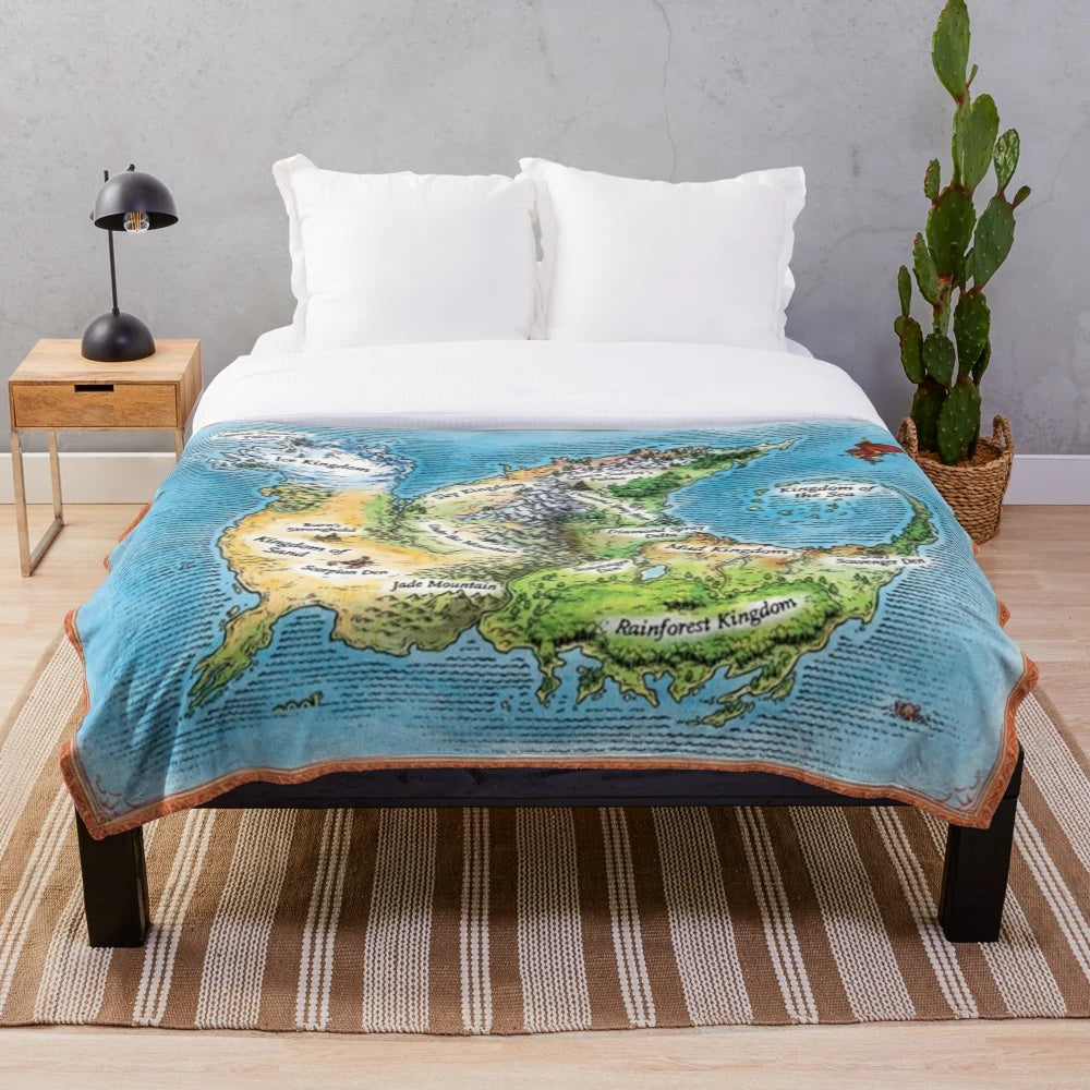 Wings of Fire plush blanket featuring a detailed map design of the fantasy dragon world