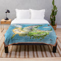 Wings of Fire plush blanket featuring a detailed map design of the fantasy dragon world