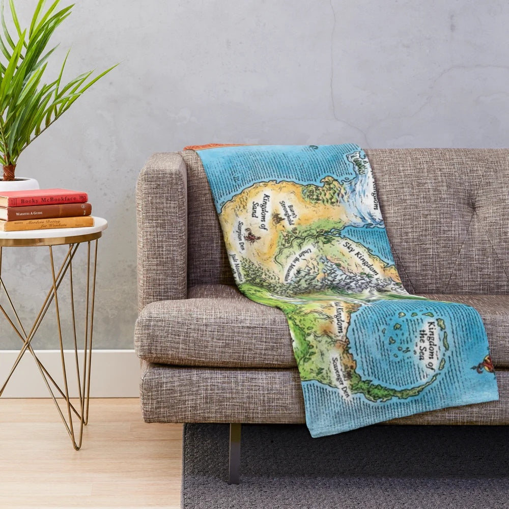 Wings of Fire plush blanket featuring a detailed map design of the fantasy dragon world
