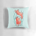 Whimsical winter fox decorative pillow with blue and red accents
