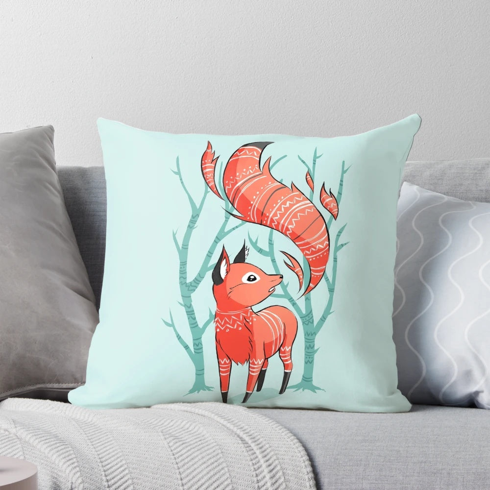 Whimsical winter fox decorative pillow with blue and red accents