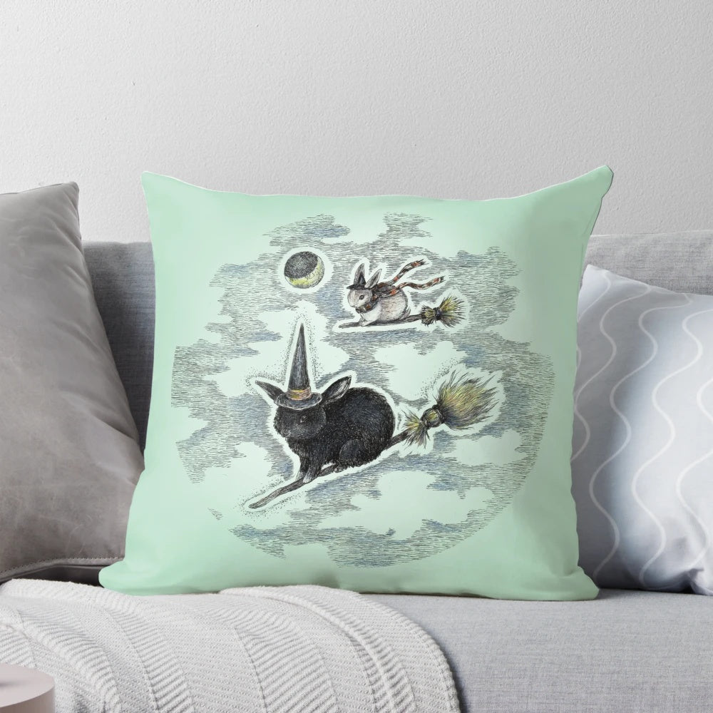 Whimsical witch bunny pillow with a full moon and gothic design