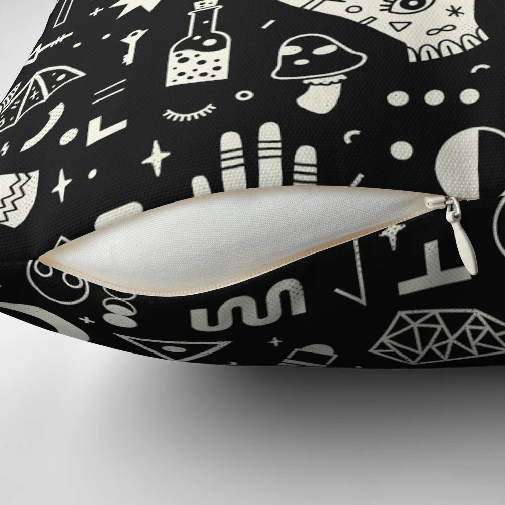 Decorative pillow featuring a witchcraft design in black and white
