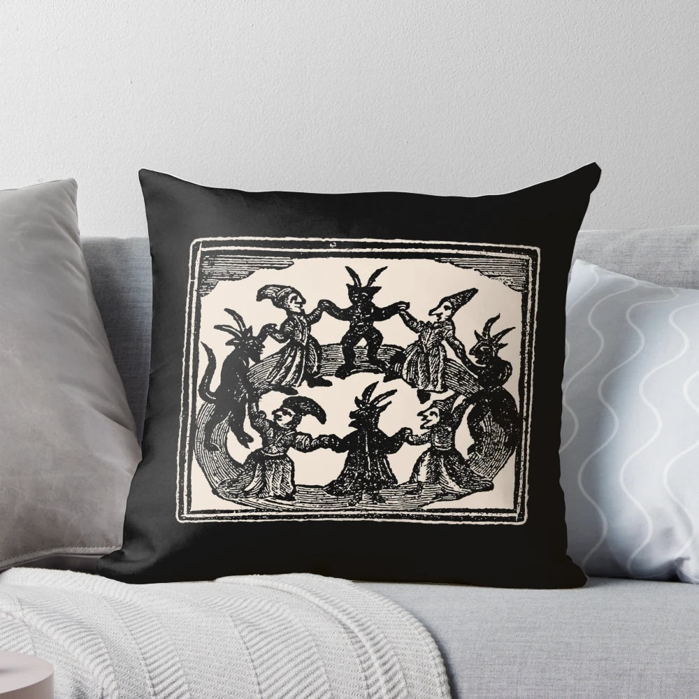 Decorative pillow featuring a woodcut-style illustration of witches dancing in a circle, perfect for Wiccan or pagan rituals and decor.