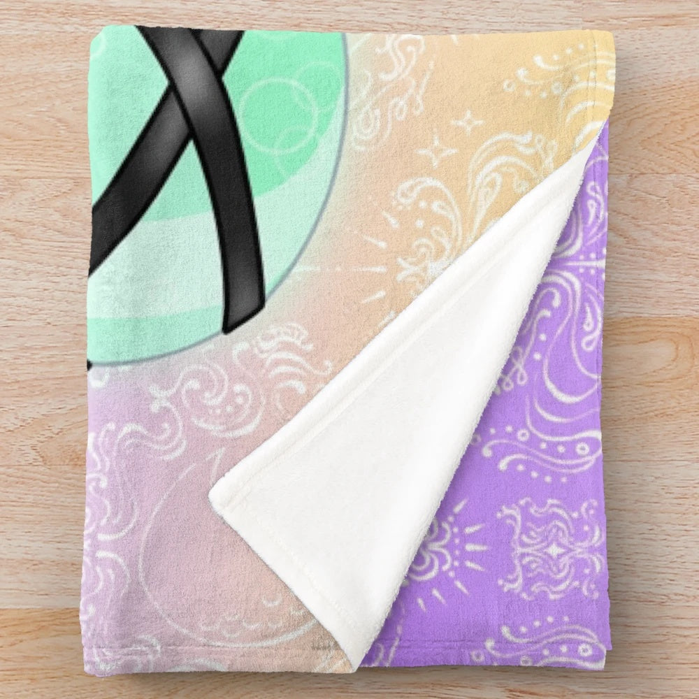 Cozy plush blanket with witch's essentials and spooky design