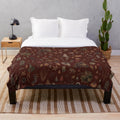 Cozy plush blanket with witchy, autumn-inspired design