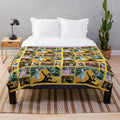 Wizard of Oz inspired plush blanket featuring a collage design of characters from the classic film