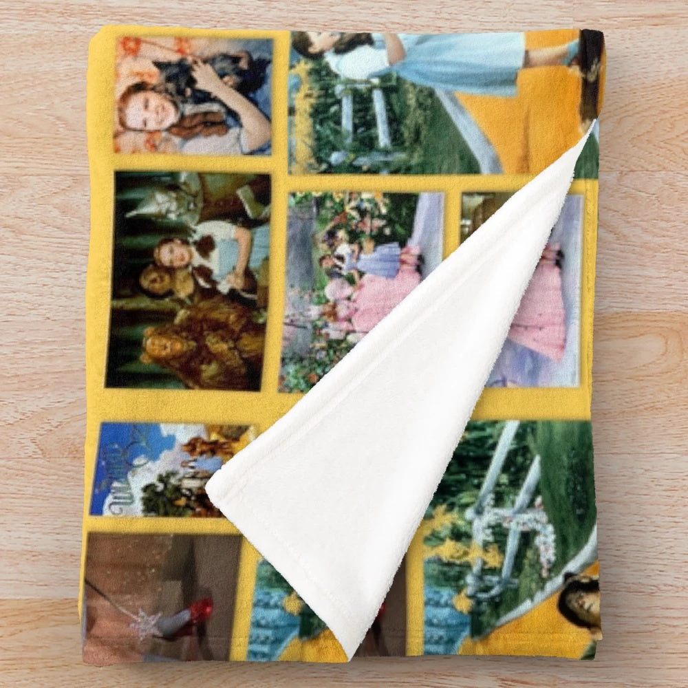 Wizard of Oz inspired plush blanket featuring a collage design of characters from the classic film