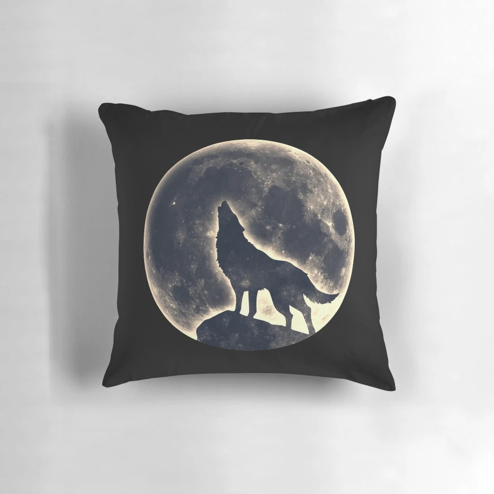 Decorative pillow featuring a majestic wolf howling at a full moon in a mystical landscape