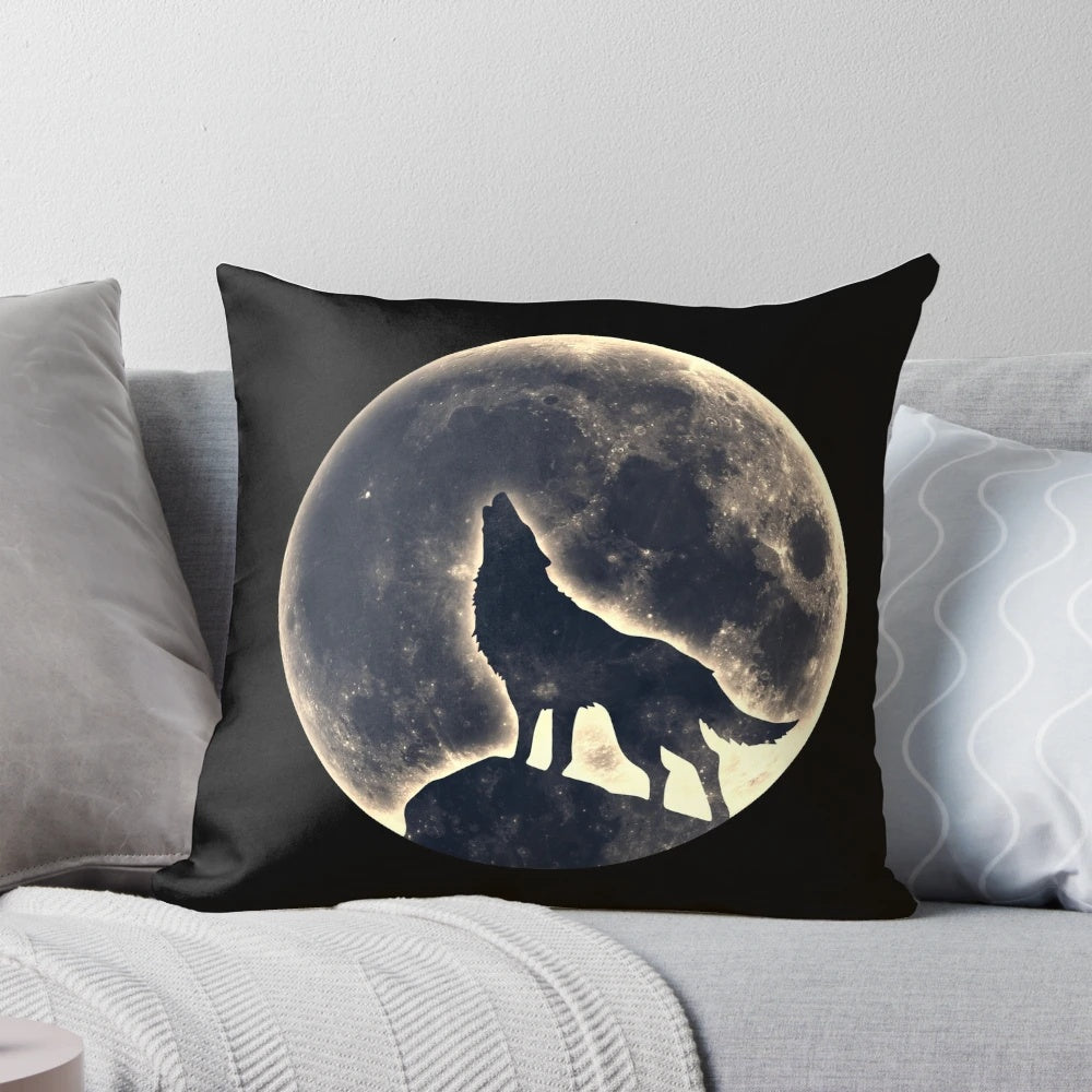Decorative pillow featuring a majestic wolf howling at a full moon in a mystical landscape