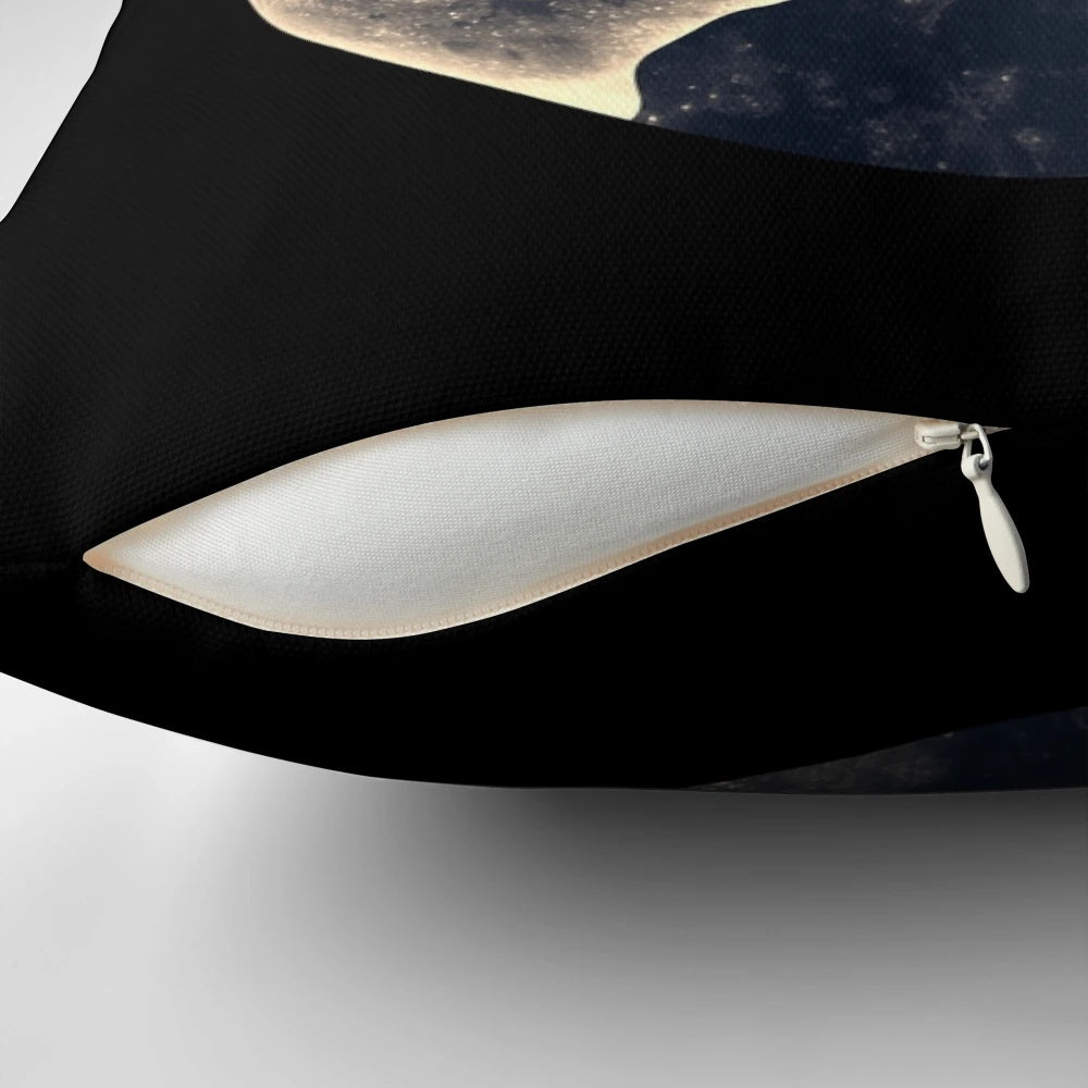 Decorative pillow featuring a majestic wolf howling at a full moon in a mystical landscape