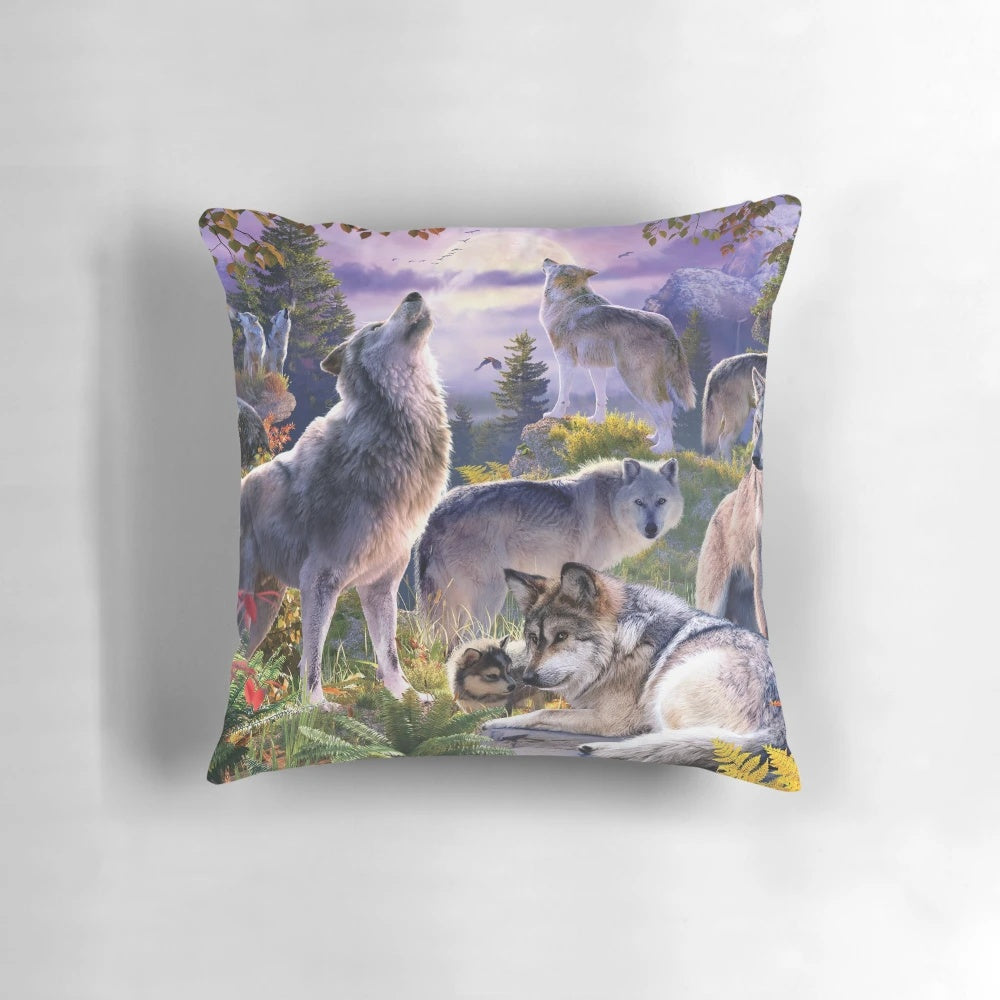 Cozy and captivating wolf pack pillow with a howling wolf under the moon.