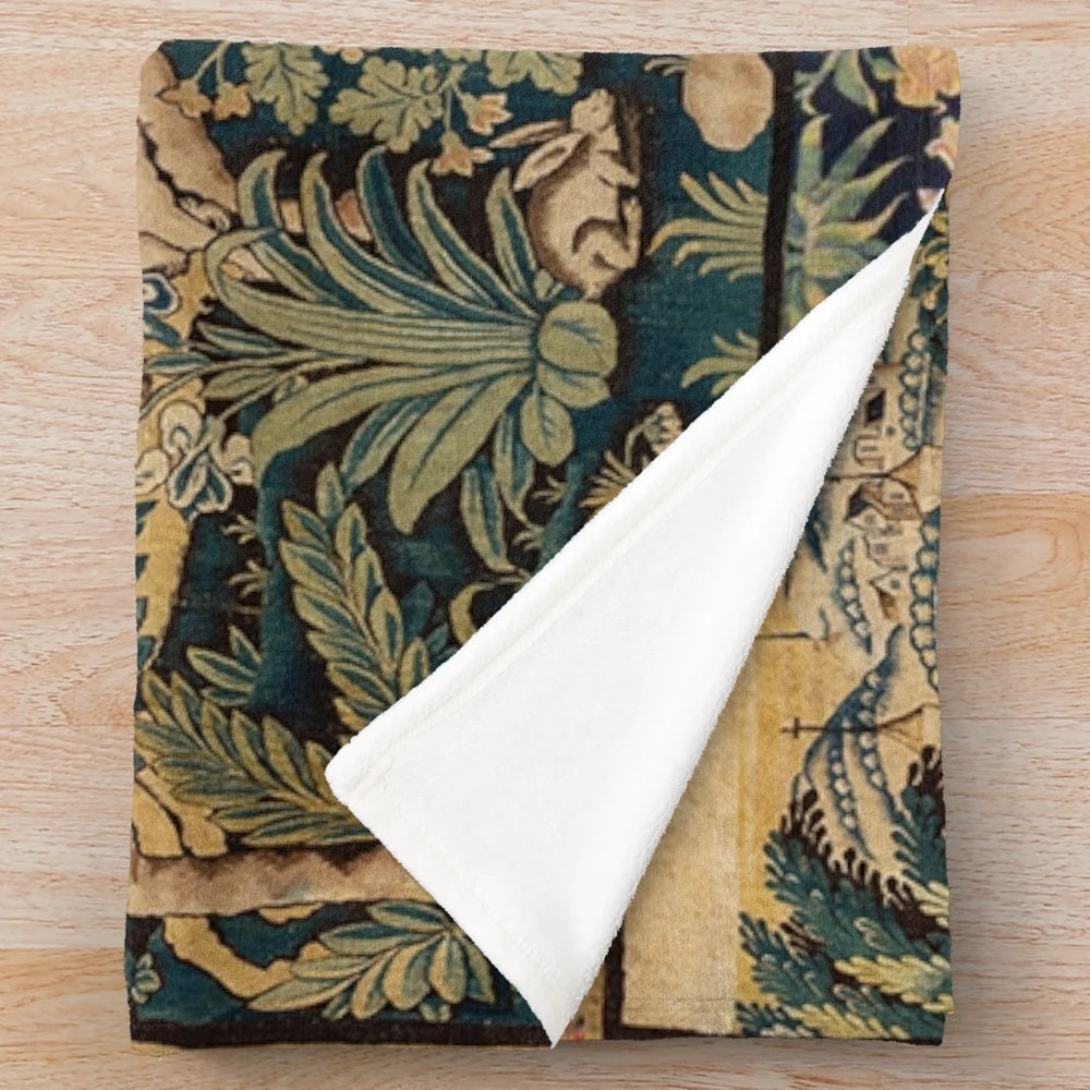 Plush blanket featuring fantasy animals and woodland creatures in an antique-inspired floral tapestry design