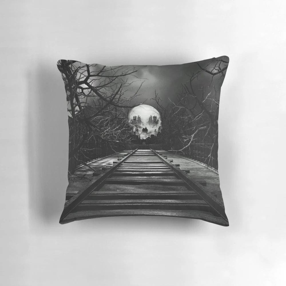 A dark and haunting pillow design featuring a gothic landscape with a skeletal figure on a railroad track under a moonlit, cloudy sky and the aurora borealis.