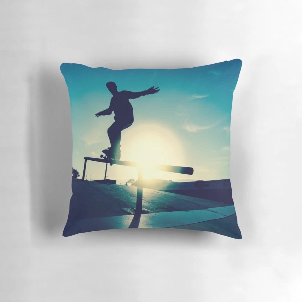 A dynamic pillow featuring a silhouette of a skateboarder performing a grind trick.