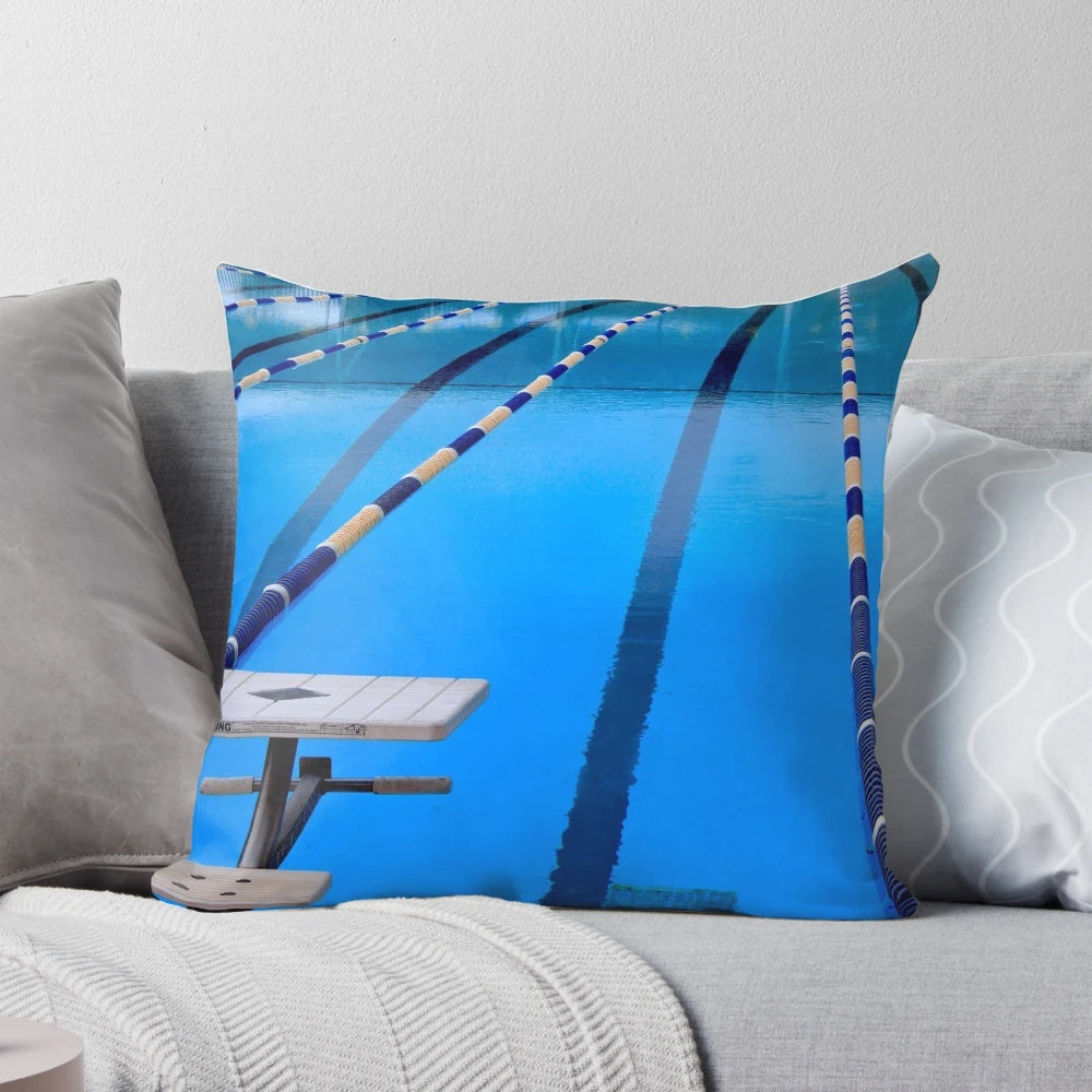 A blue and cool pillow designed for swimming pool enthusiasts and competitive swimmers.