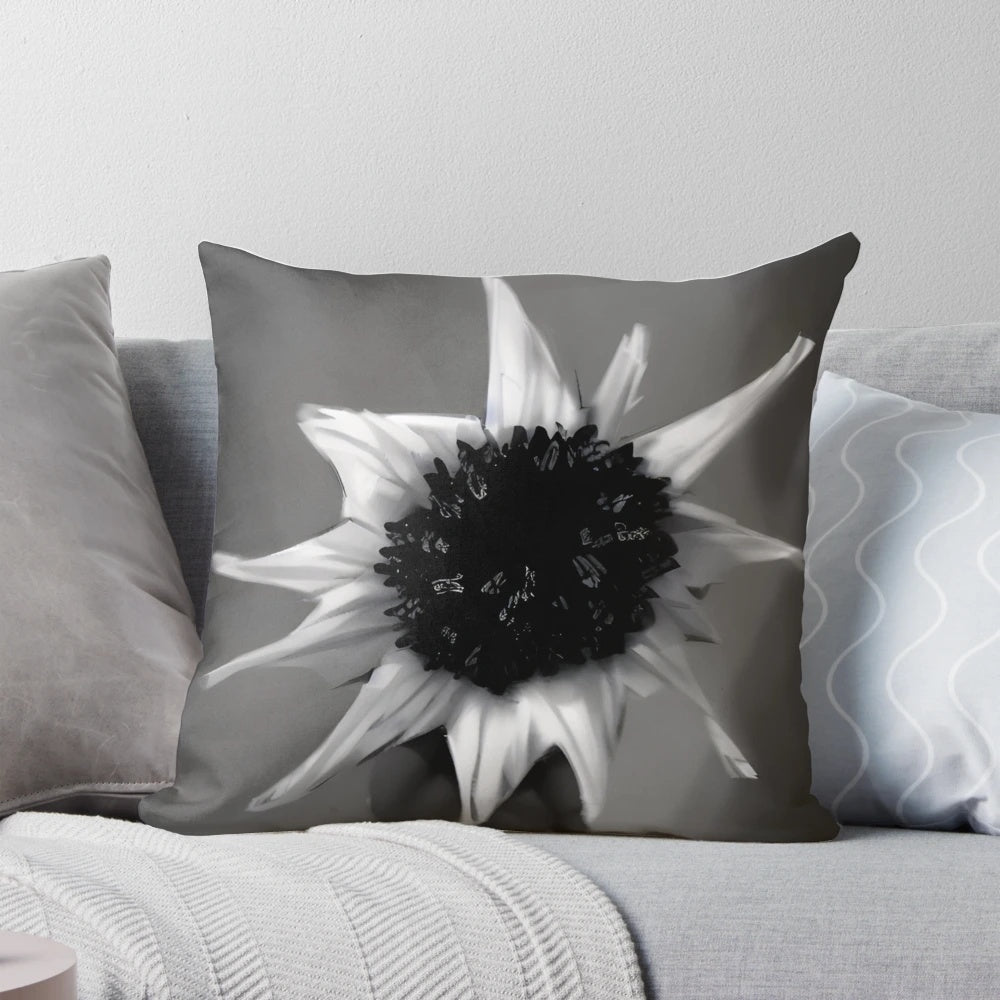 Monochromatic pillow featuring a surreal, abstract floral design with a focus on contrast and minimalist form.