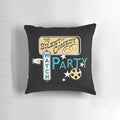 A cozy pillow perfect for a silent comedy watch party, featuring vintage film elements.