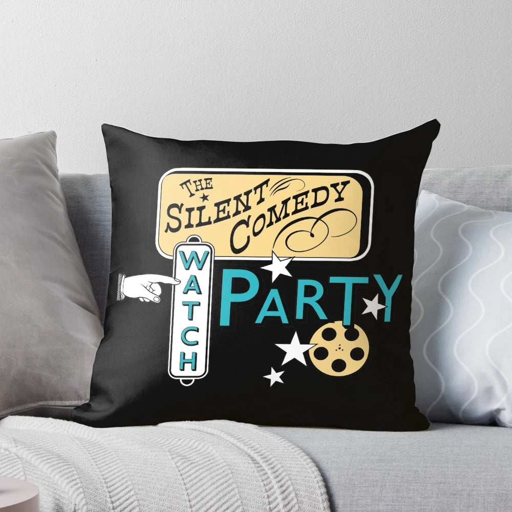 A cozy pillow perfect for a silent comedy watch party, featuring vintage film elements.