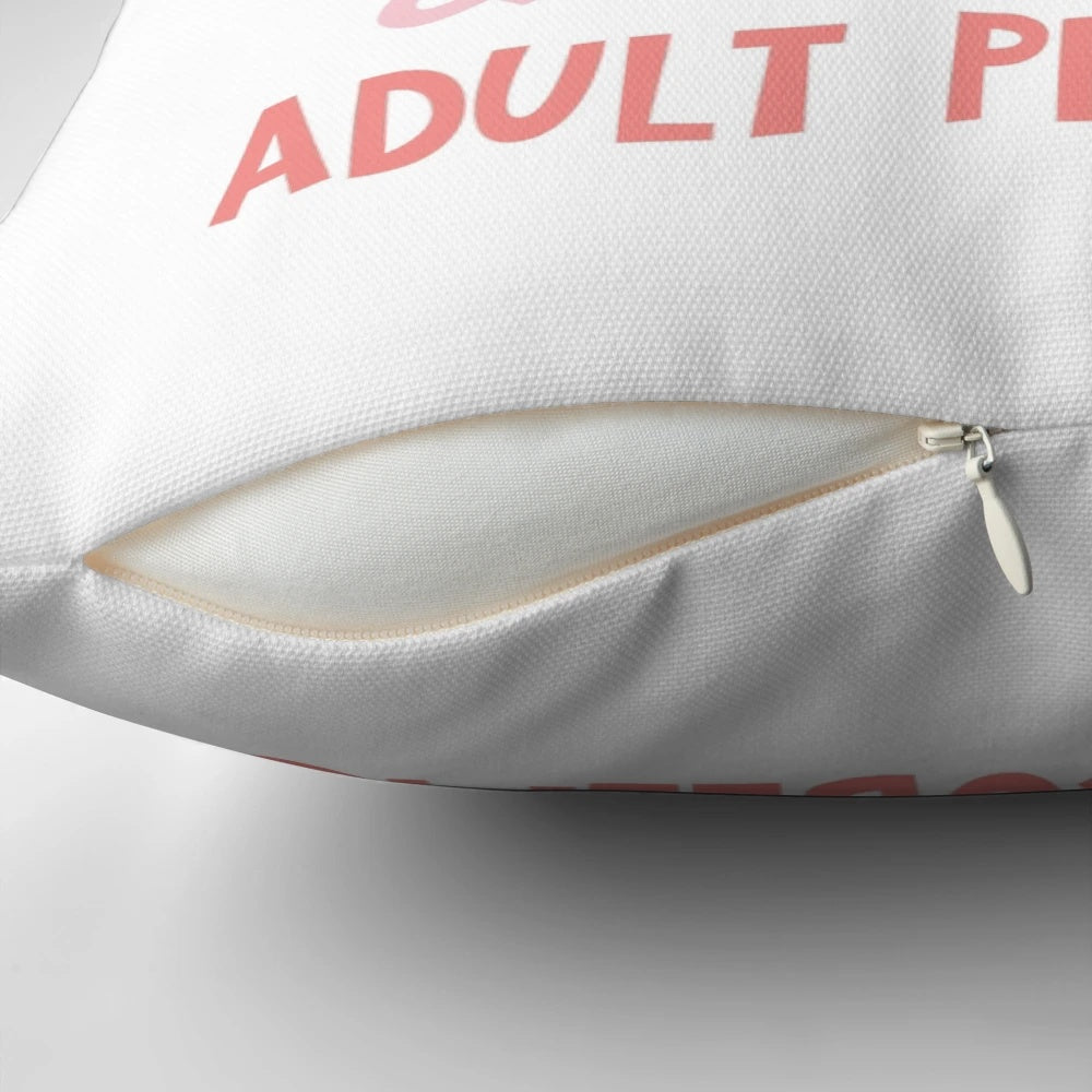 A black and white pillow with the text "I just want to listen to kpop and forget about my adult problems" in a typographic design.