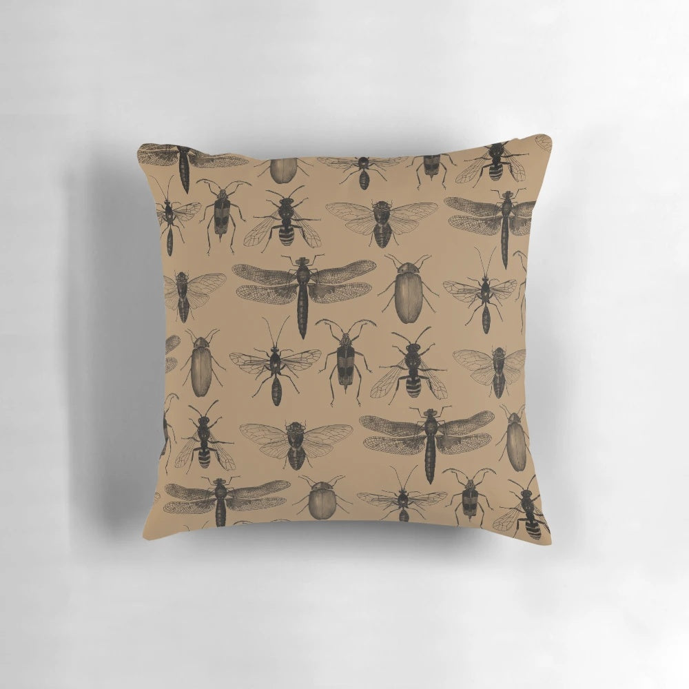 Pillow featuring a vibrant, nature-inspired insect pattern design.